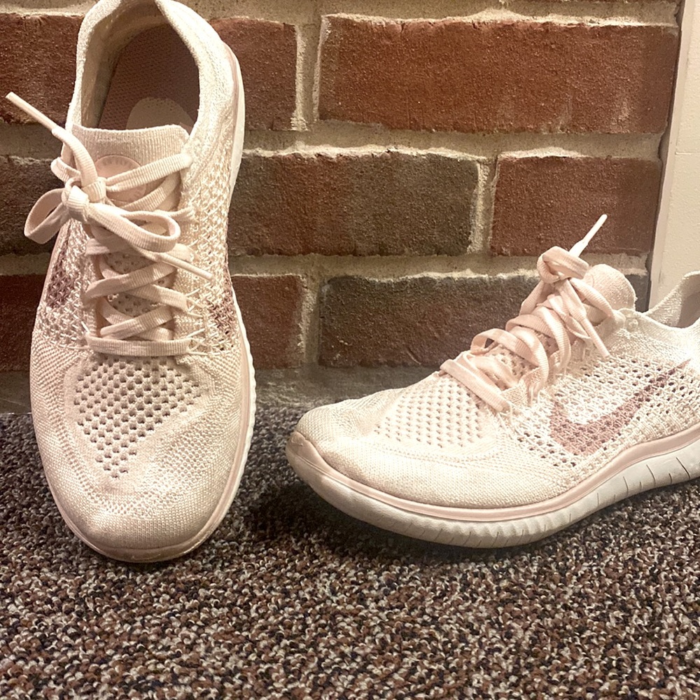 Nike free sneaker size 8 light pink in color